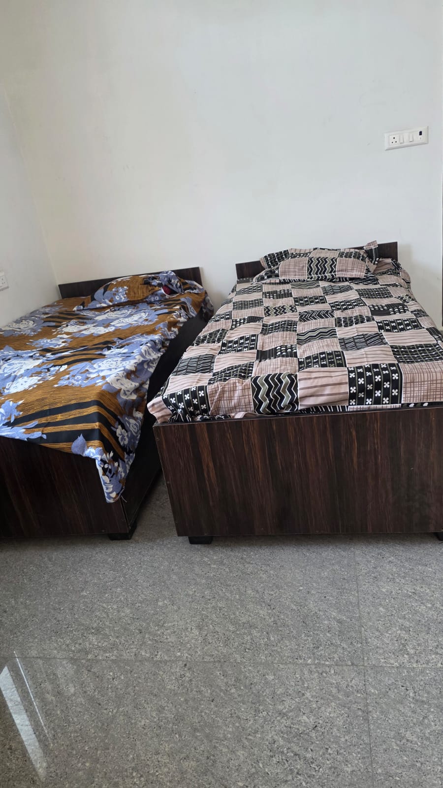 Furnished bedroom with twin beds